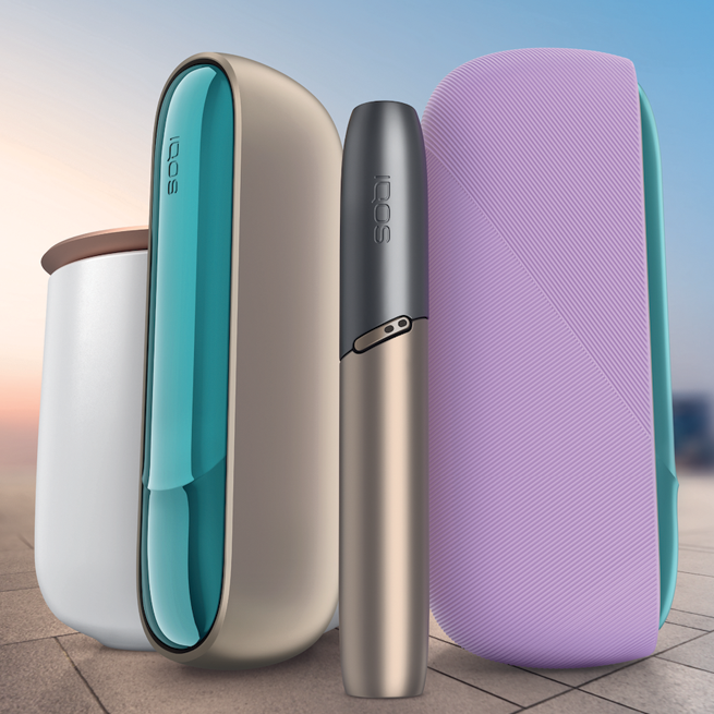 a Hand holding an iqos device